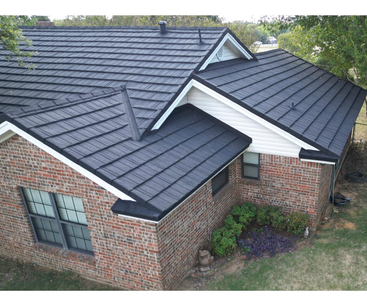 Recent stone-coated steel roofing project by Ryze Roofing & Construction